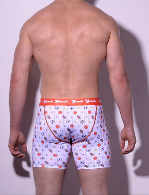 GG Ginch Gonch Hardball Boxer Brief Trunk - Men's Underwear - pin striped white fabric with basketballs, footballs, soccer balls, tennis balls, and baseballs. Orange trim and y front with orange printed waistband back