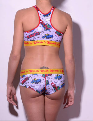 GG Ginch Gonch Under-Man boy cut Brief gogo - women's Underwear comic-inspired print on gray background with cartoon words. Red trim and yellow printed waistband back shown with matchingg sports bra