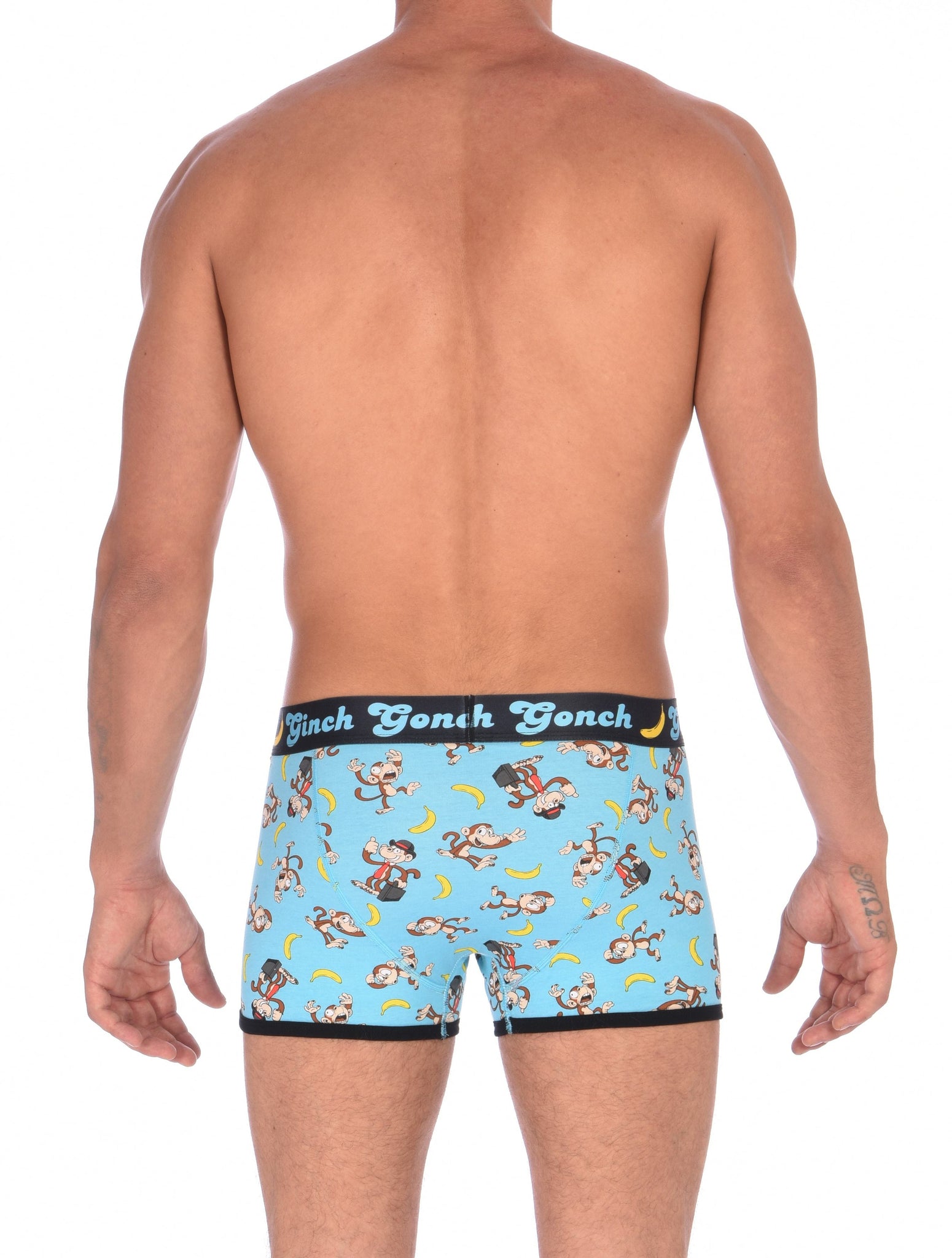 Ginch Gonch Monkey Business Men's Underwear Boxer Brief, Trunk, with blue background, monkeys, and bananas. Black trim and printed waistband with Ginch Gonch and bananas. Back