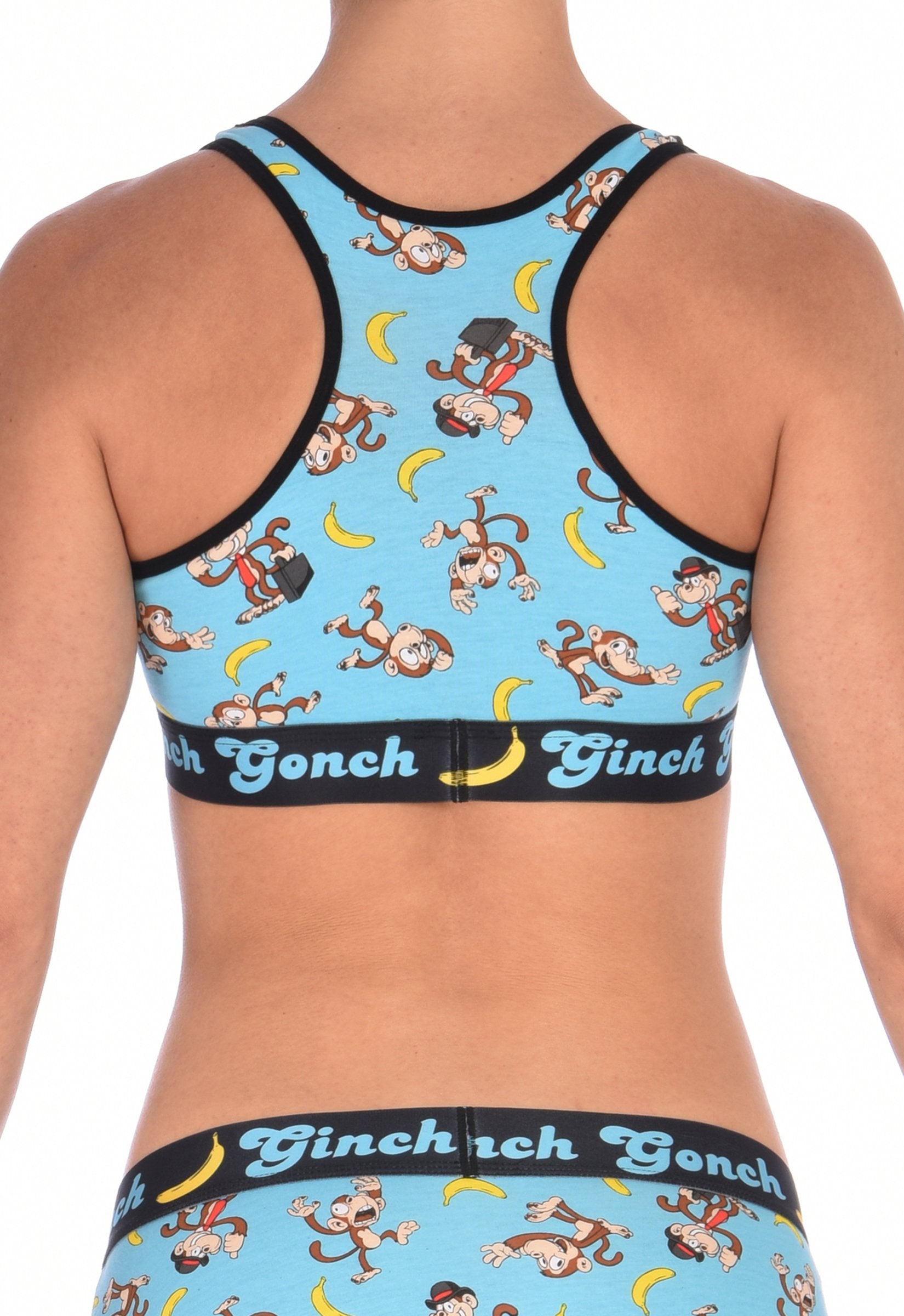 Ginch Gonch Monkey Business Women's Sports Bra Underwear with blue background, monkeys, and bananas. Black trim and printed waistband with Ginch Gonch and bananas. Back.