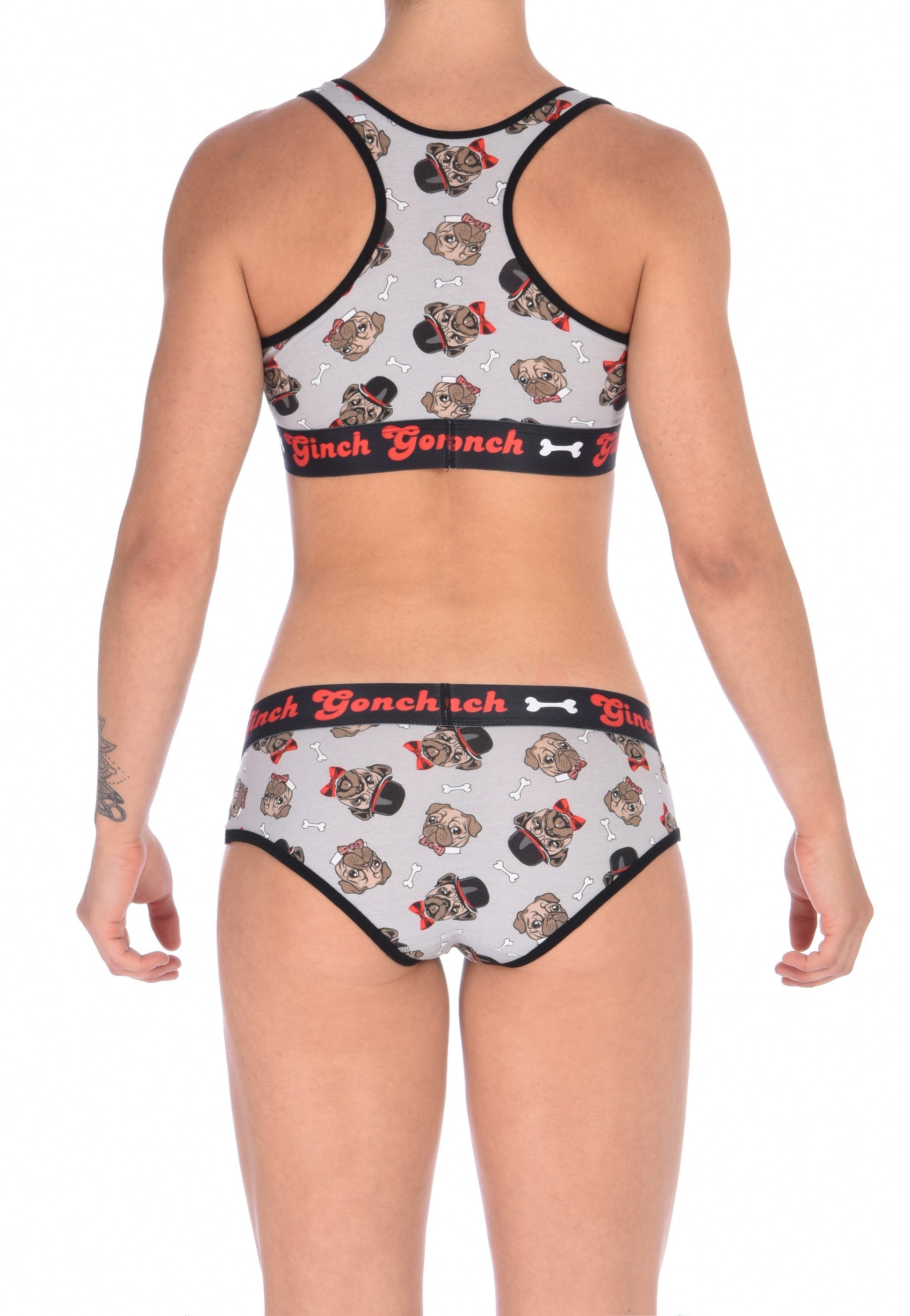 GG Ginch Gonch Pug Life boy cut brief y front - women's Underwear grey background with pugs with top hats and bow ties and bones. Black trim with black printed waistband back. Shown with matching sports bra