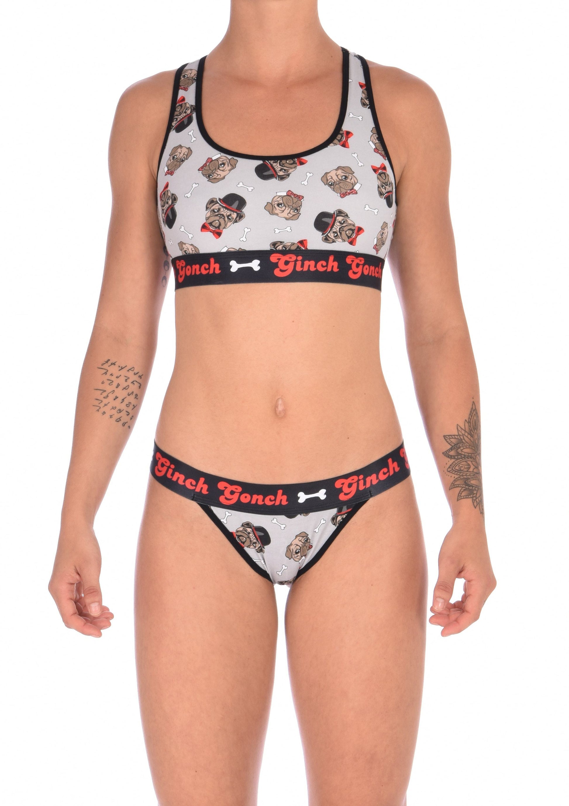 GG Ginch Gonch Pug Life thong - women's Underwear grey background with pugs with top hats and bow ties and bones. Black trim with black printed waistband front. Shown with matching sports bra