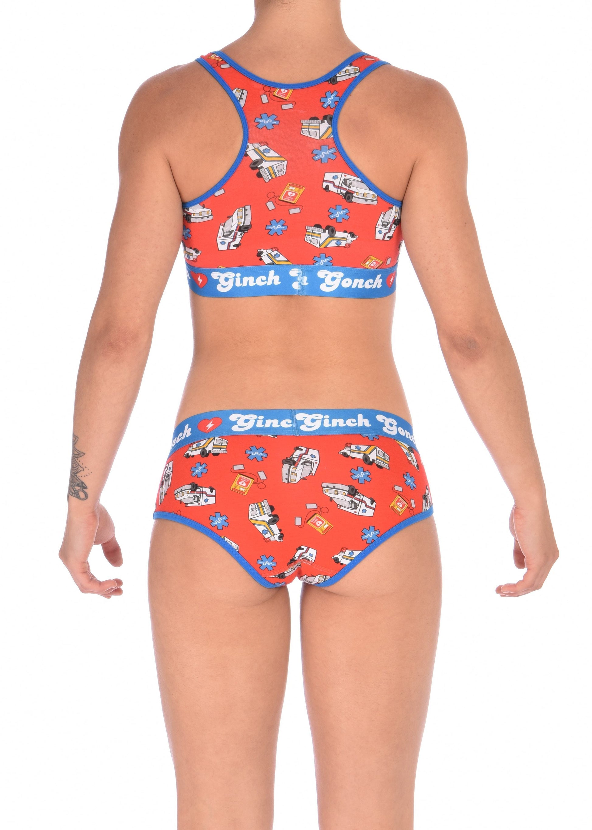 Ginch Gonch GG EMT boy cut Brief women's ambulance print with medical symbol and equipment on red background with blue trim and printed waistband back shown with matching sports bra