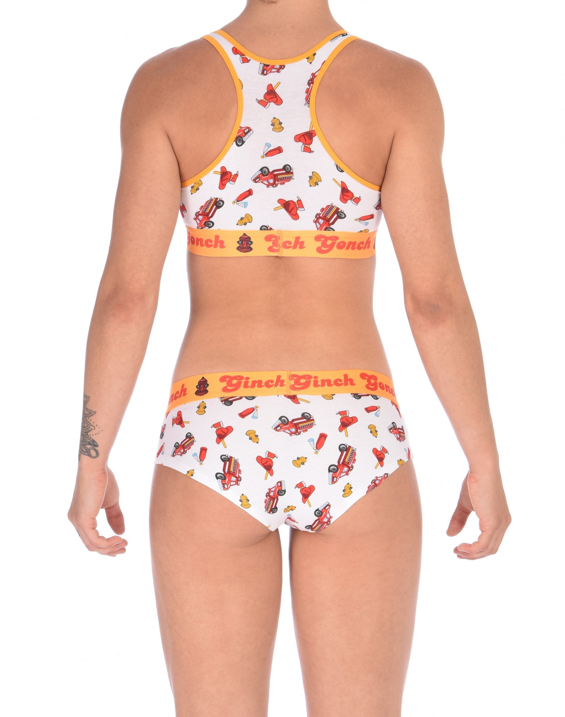 Ginch Gonch GG Fire Fighters boy cut Brief womens underwear white fabric with fire engines hats and hydrants, yellow trim and yellow printed waistband back shown with matching sports bra