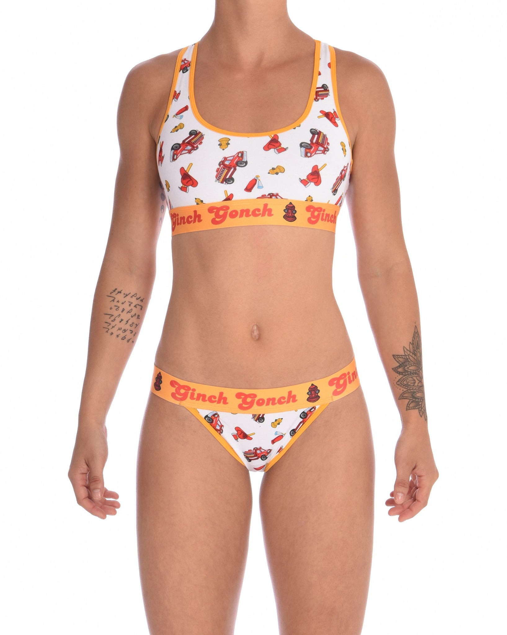 Ginch Gonch GG Fire Fighters sports bra women's underwear y front white fabric with fire engines hats and hydrants, yellow trim and yellow printed band front shown with matching thong